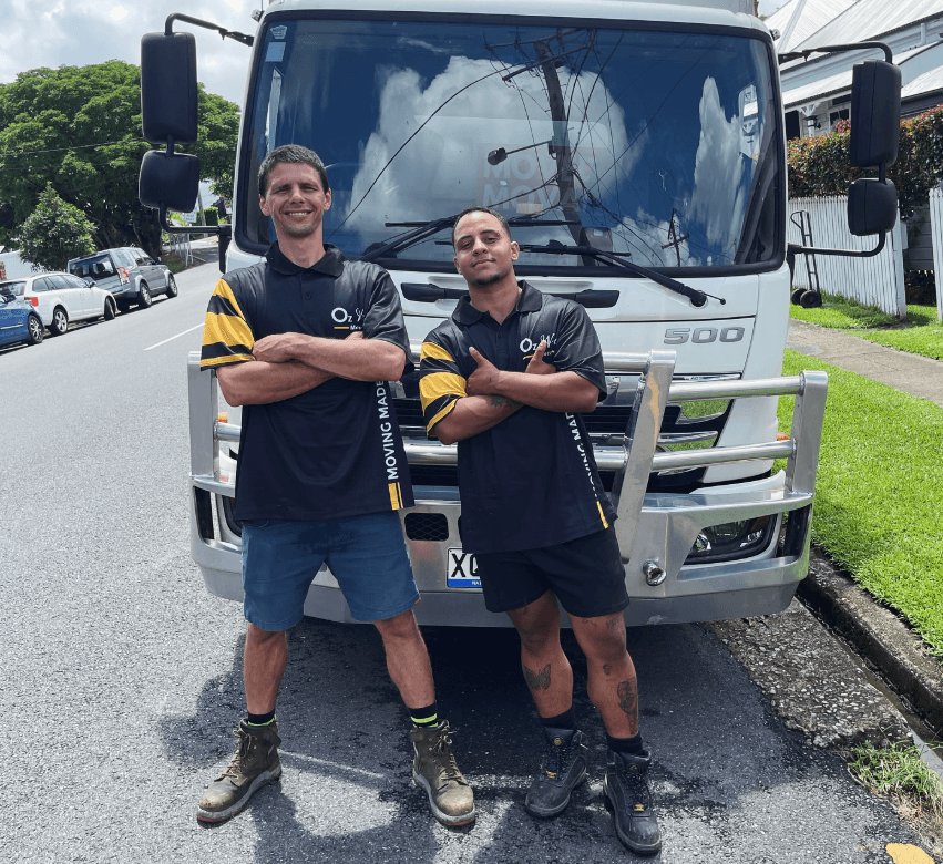Oz Wide Movers crew with a company moving truck