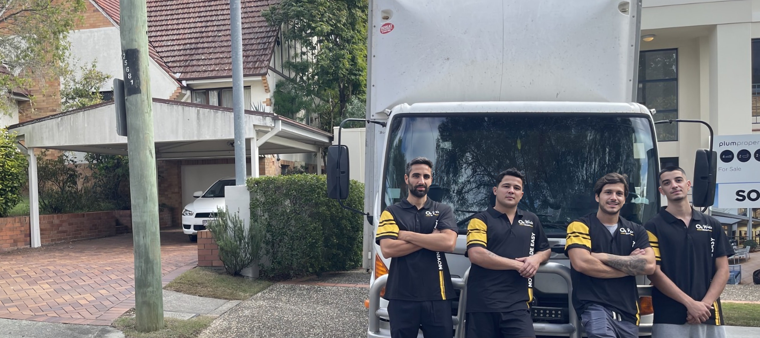 Ozwide Movers truck driving through Adelaide