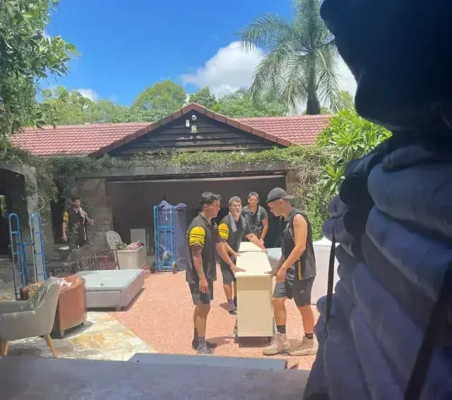 Reliable furniture removalists packing household items.