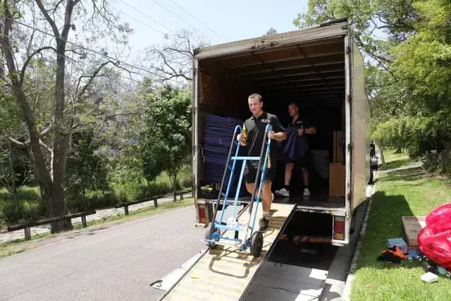Sydney removalists truck parked in front of a residential home