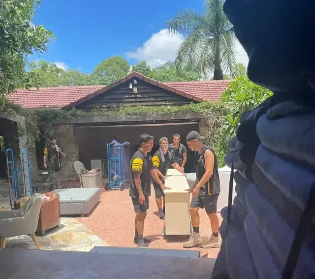 Reliable furniture removalists packing household items.